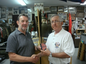 C.W.O. Ray Coulson, CD (Ret'd), Curator, on the right accepting Willy's diary for display at the Nova Scotia Highlanders Regimental Museum in Amherst, Nova Scotia